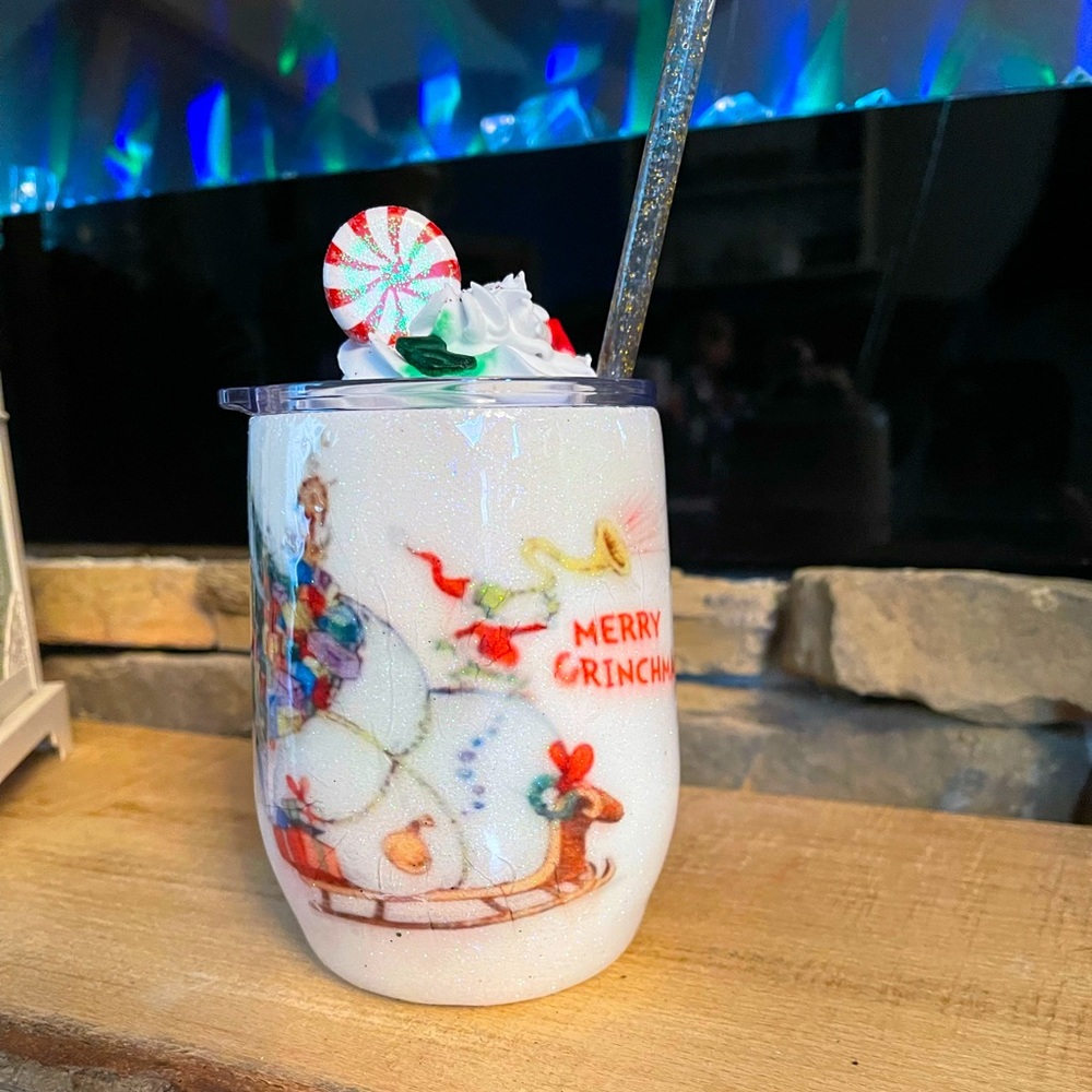 The grinch tumbler cup with fake whip cream